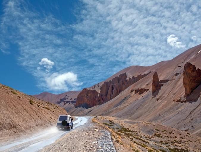 a drive through the valley of snow capped mountains and alpine lakes !